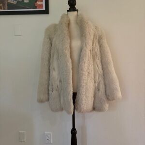 Real spotted fox fur coat